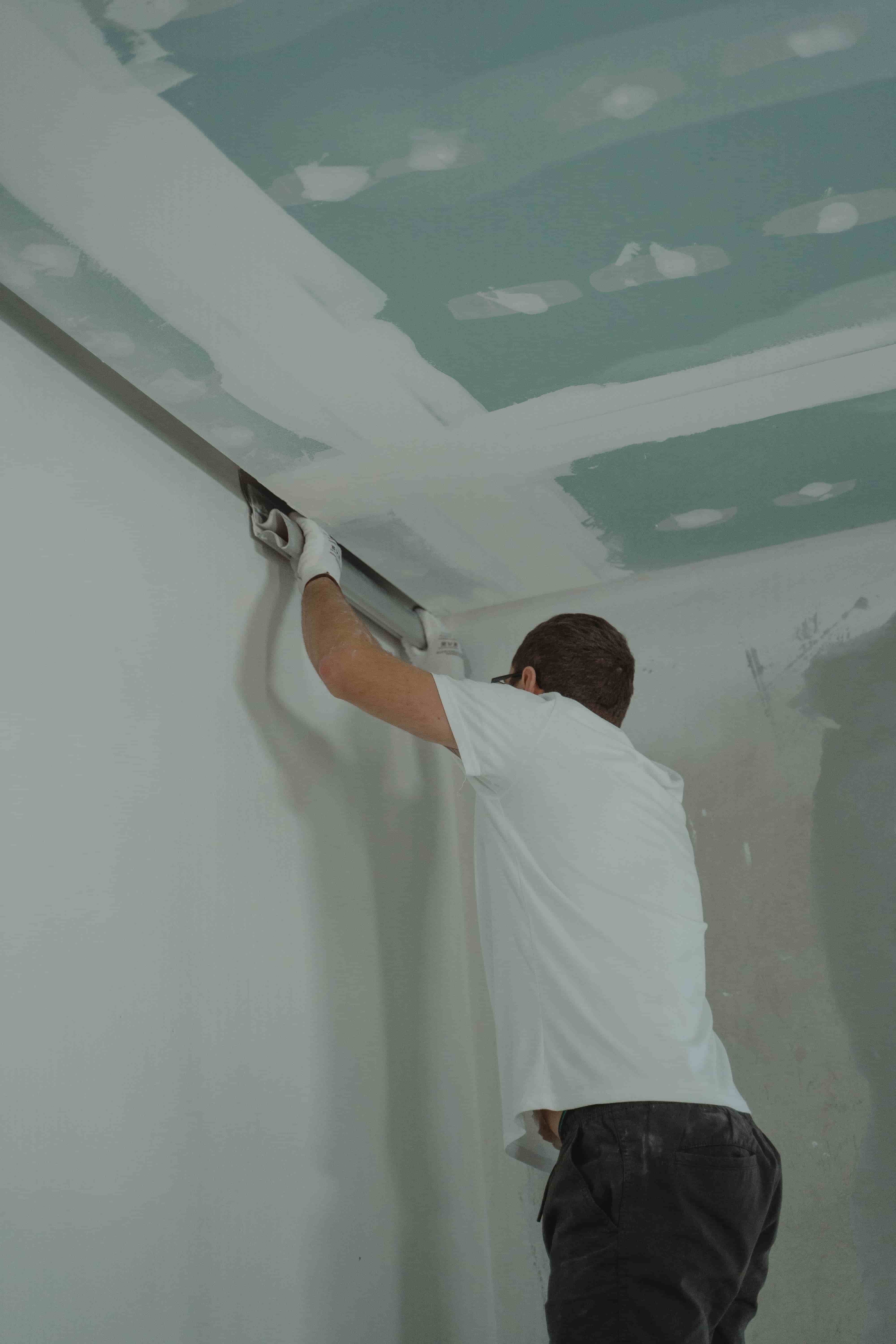Drywall repair and skim coating after popcorn removal