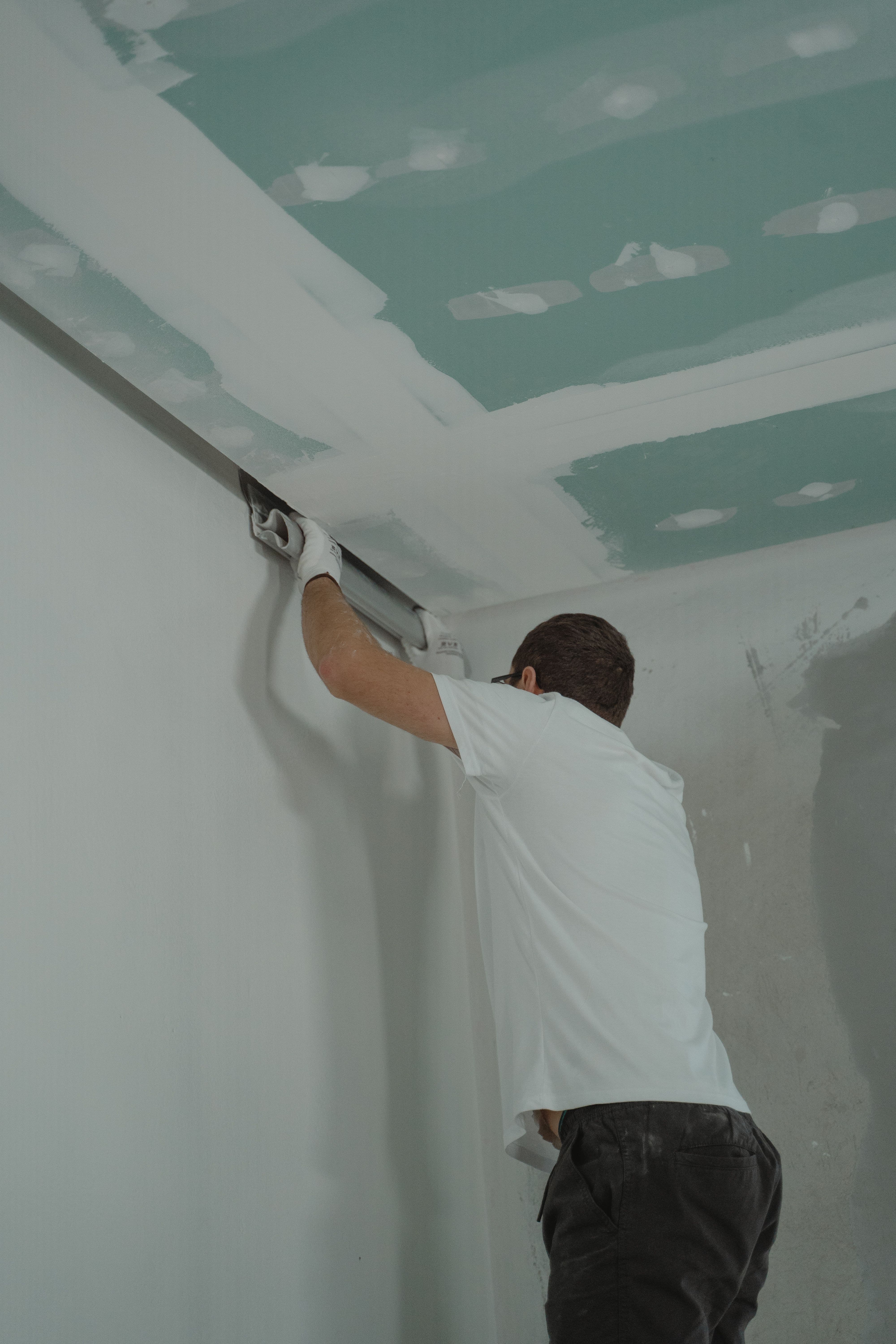 Drywall repair and skim coating after popcorn removal
